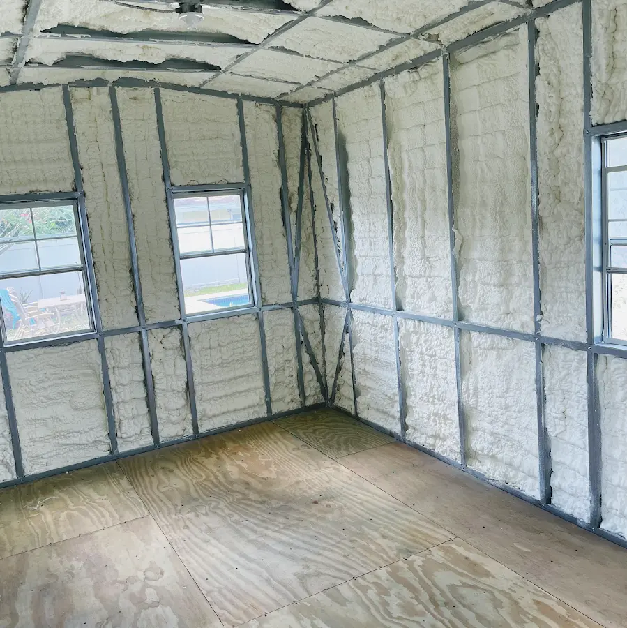 Closed-cell spray foam insulation applied to wall cavities in a residential project in Norwich